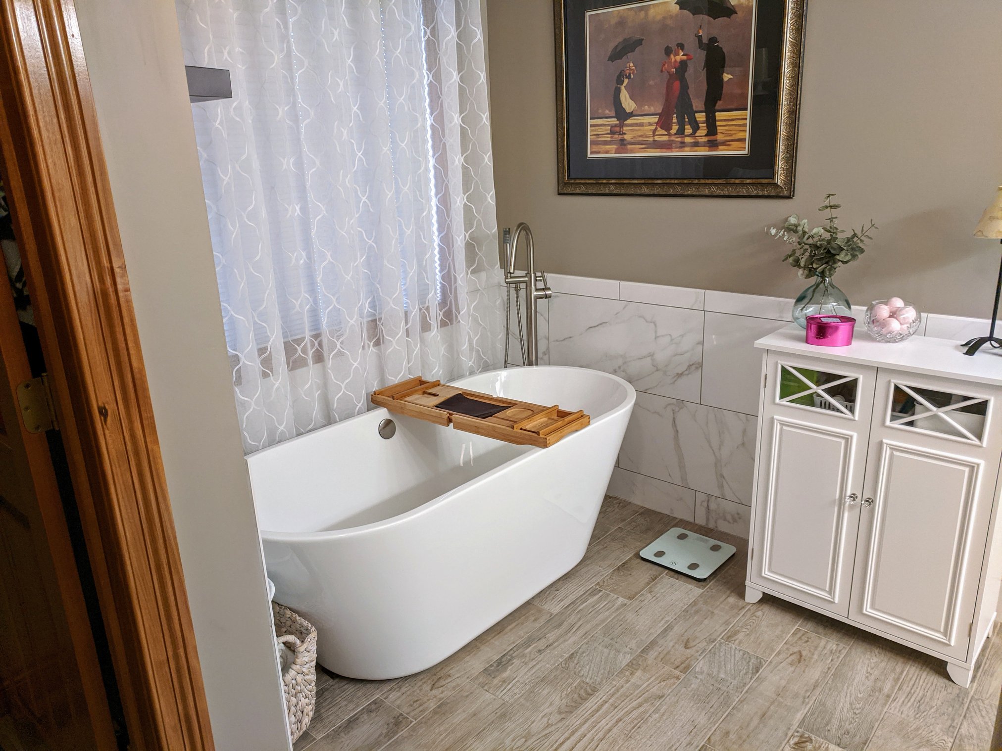 Spa-style bathroom with freestanding tub